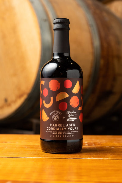 Bourbon Barrel Aged Cordially Yours - Old Ale Aged in Bourbon Barrels with Orange Peel, Cherries, Cacao Nibs and Cinnamon